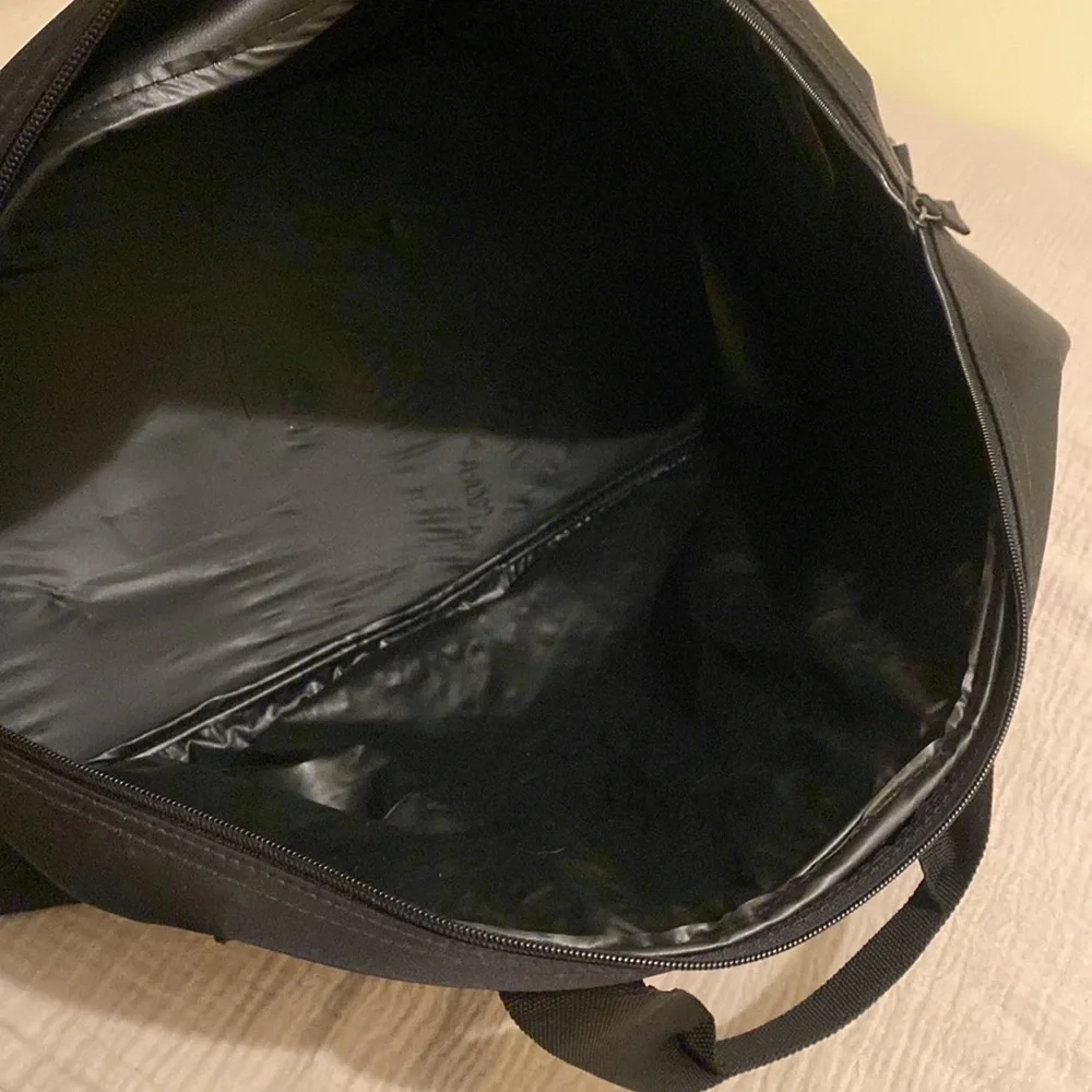 Giorgio Armani Perfums Classic Black Duffel Bag. Unisex model